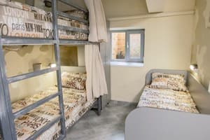 Хостел Bunker Hostel. Место в мужском 12-местном номере  3