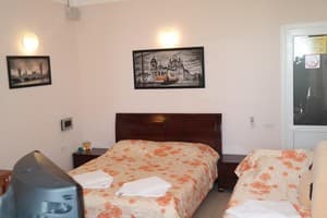 Гостиный двор Черноморский 18. Стандарт 4-местный  с общей террасой 2