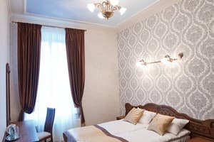 Мини-отель Inn Lviv. Семейный 4-местный люкс с двумя спальнями 4