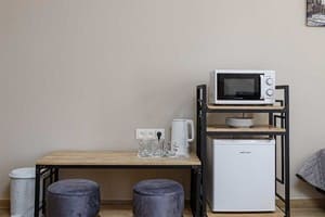 Отель Кайзер во Львове. Полулюкс 5-местный с кроватью размера king-size и миникухней 7