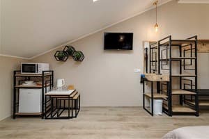 Отель Кайзер во Львове. Семейный 4-местный с мини кухней Мансарда 6