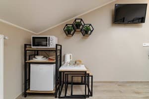 Отель Кайзер во Львове. Семейный 4-местный с мини кухней Мансарда 10