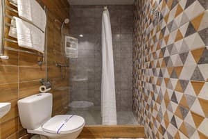 Отель Кайзер во Львове. Семейный 4-местный с мини кухней Мансарда 12