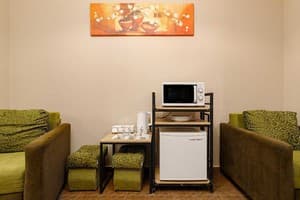 Отель Кайзер во Львове. Улучшенный 4-местный с кроватью размера  king-size и мини кухней 3