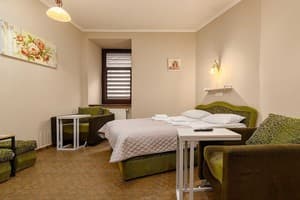 Отель Кайзер во Львове. Улучшенный 4-местный с кроватью размера  king-size и мини кухней 8