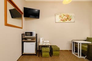 Отель Кайзер во Львове. Улучшенный 4-местный с кроватью размера  king-size и мини кухней 9