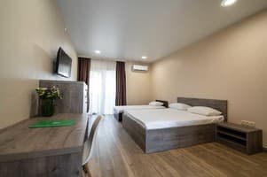 Отель Weekend Family Hotel. Делюкс 4-местный с видом на море 1